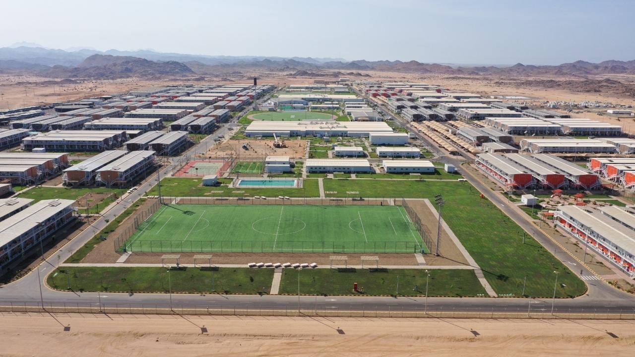 Aerial view of completed landscape and sports fields at a worker camp