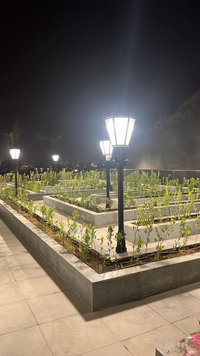 Night garden planters with decorative lighting
